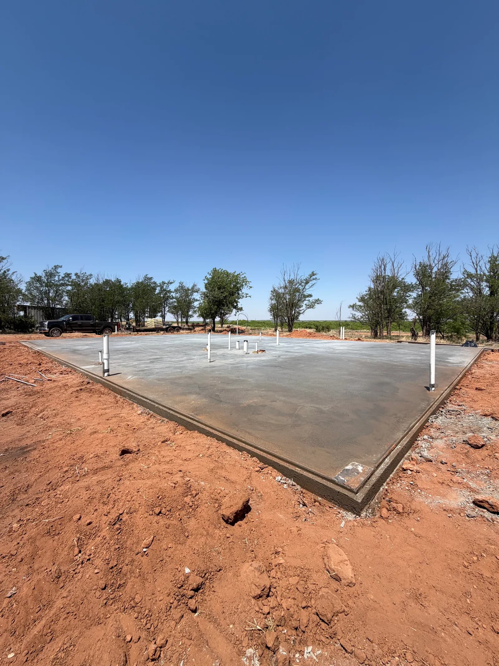 Childress Barndominium Foundation — concrete pour in progress in Childress, TX