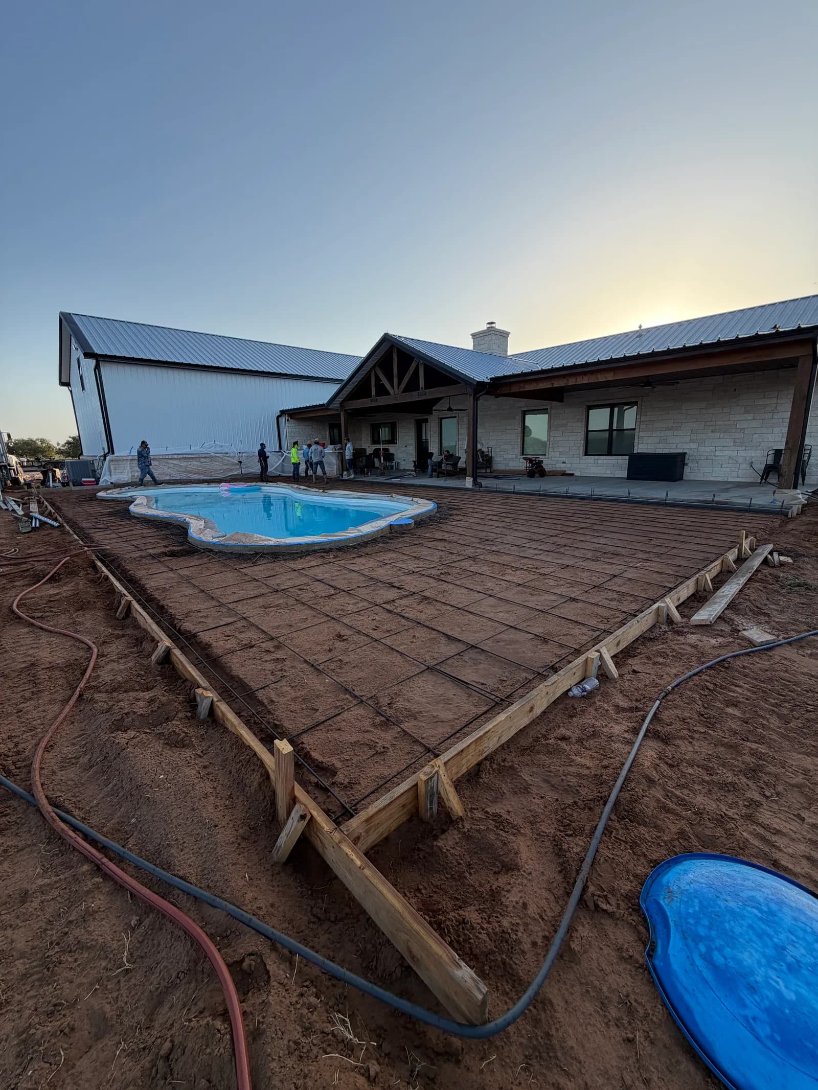 El Dorado Concrete Pool Deck — screeding the deck to fall away from the water in El Dorado, OK