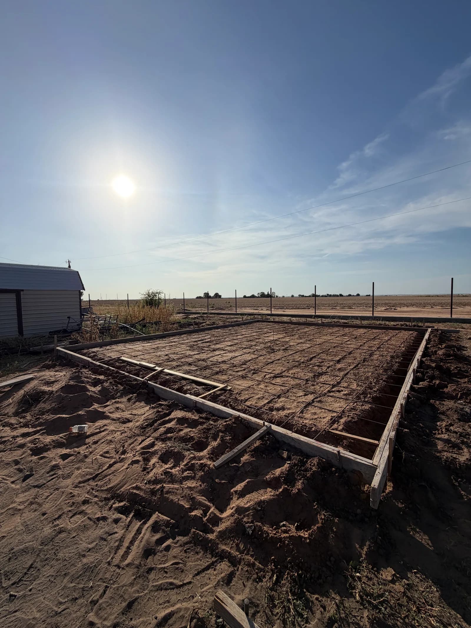 Vernon 24' x 30' Metal Building Foundation — forming and reinforcement on the open site in Vernon, TX