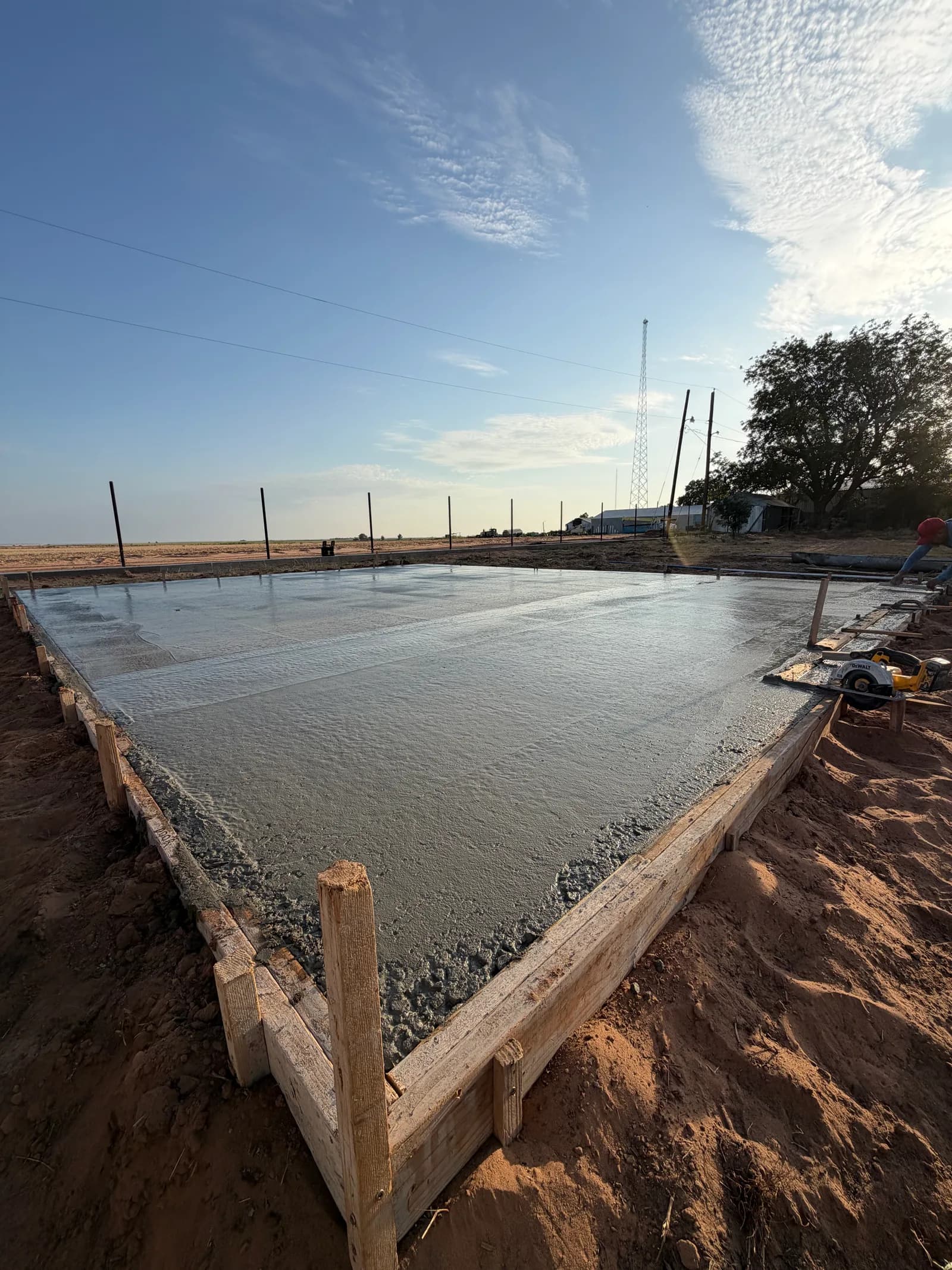 Vernon 24' x 30' Metal Building Foundation — finishing the slab surface in Vernon, TX