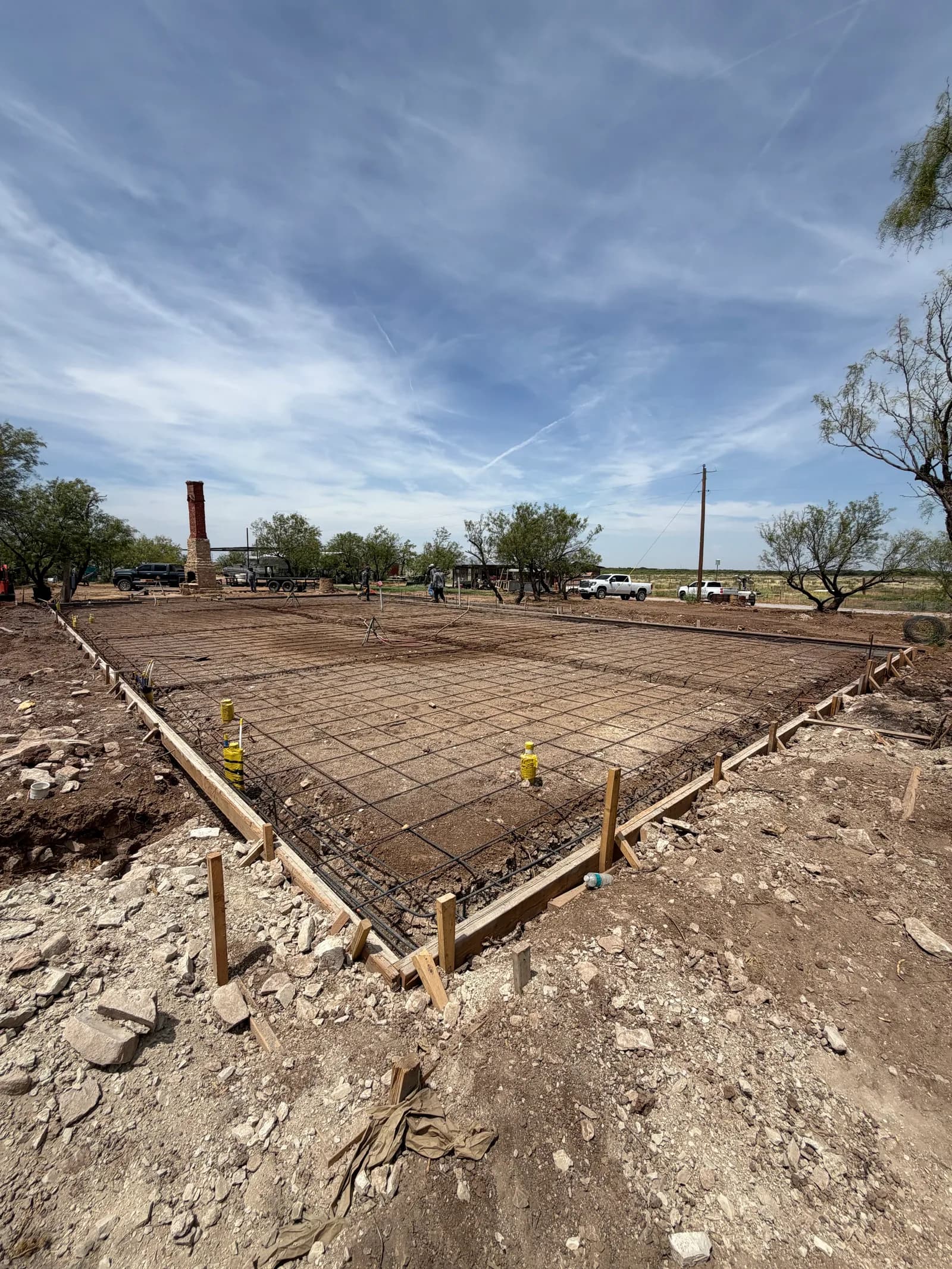 Quanah 40' x 80' Barndominium Foundation — screeding and finishing the continuous slab in Quanah, TX
